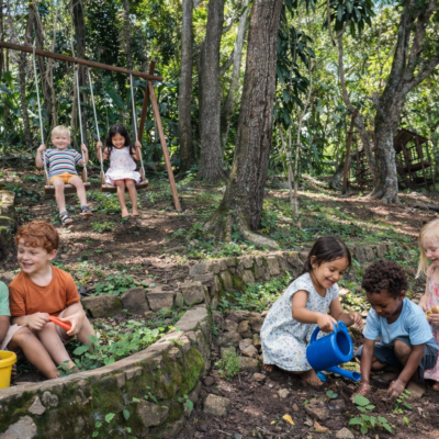 Children at play in Fern House Montessori outdoor environment